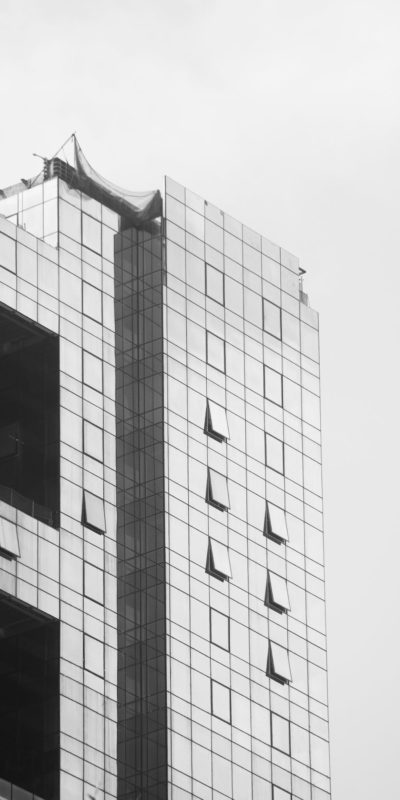 Black and white photo of a building with a window